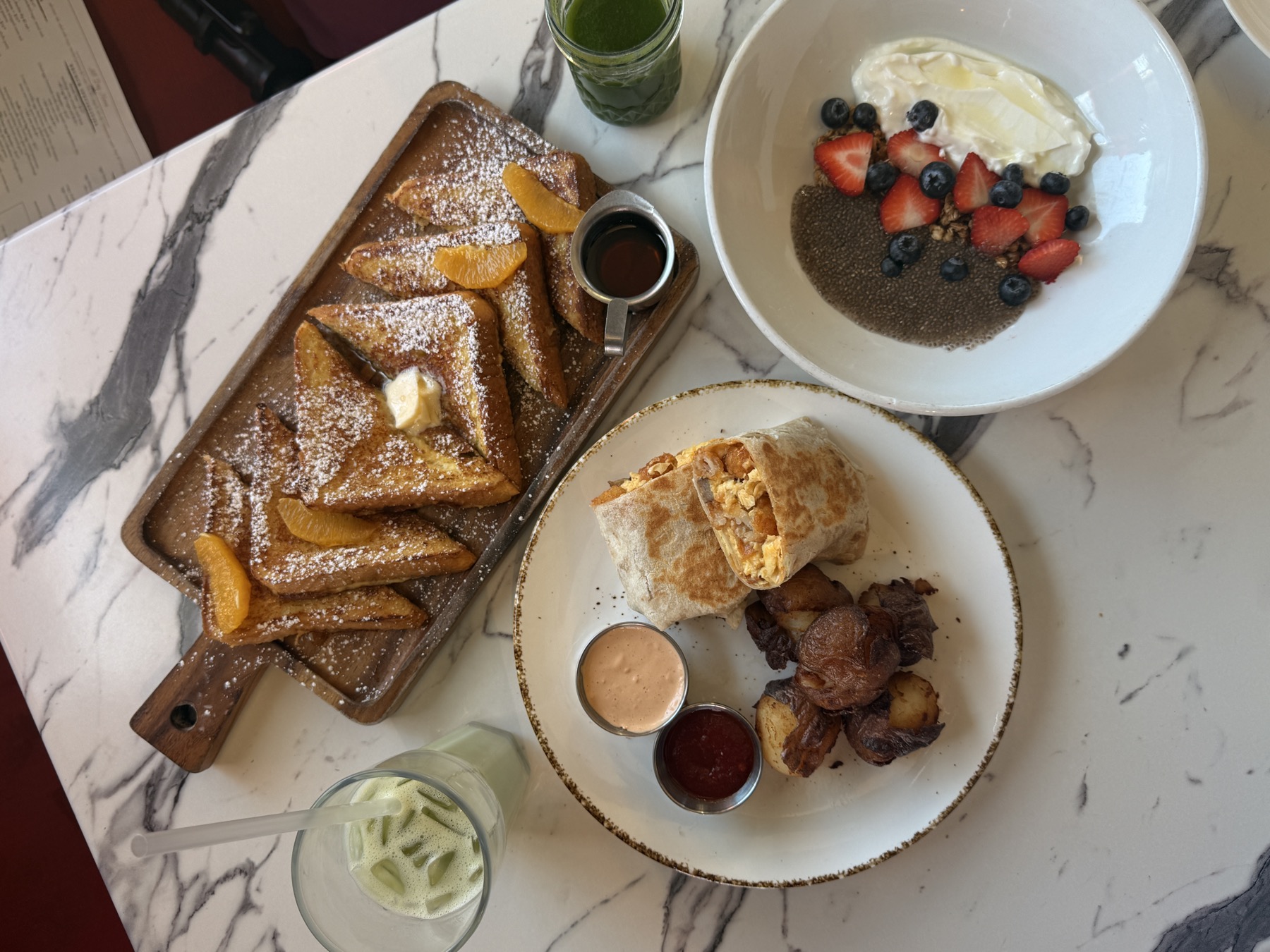 Styled plates and cocktails on a table